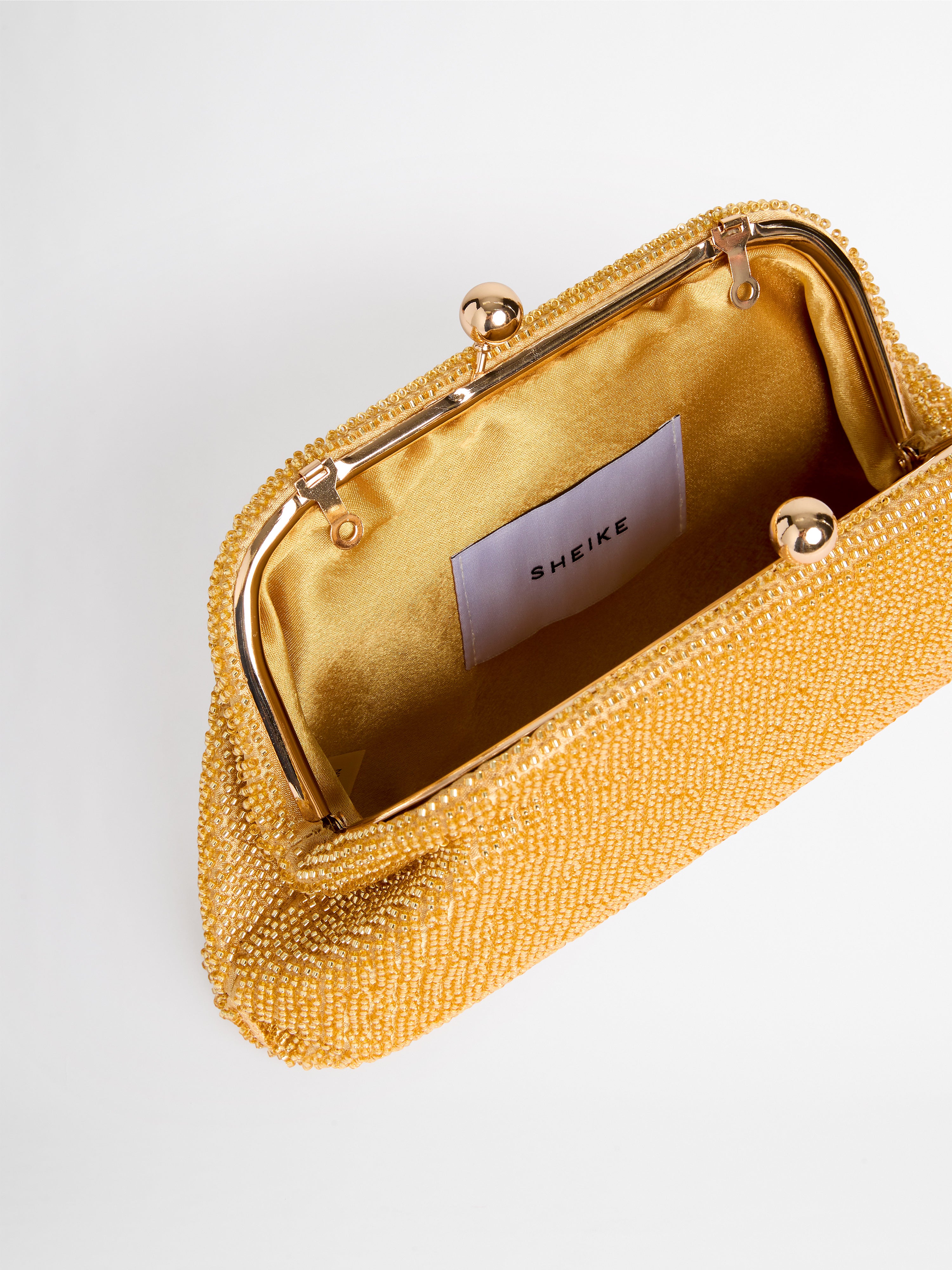 Maiyet Gold-trimmed deals clutch